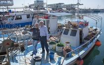 Andreas Christou with the President of fishermen association.