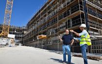 Nikolaos Zamboglou at the construction site of the German Oncology Center.