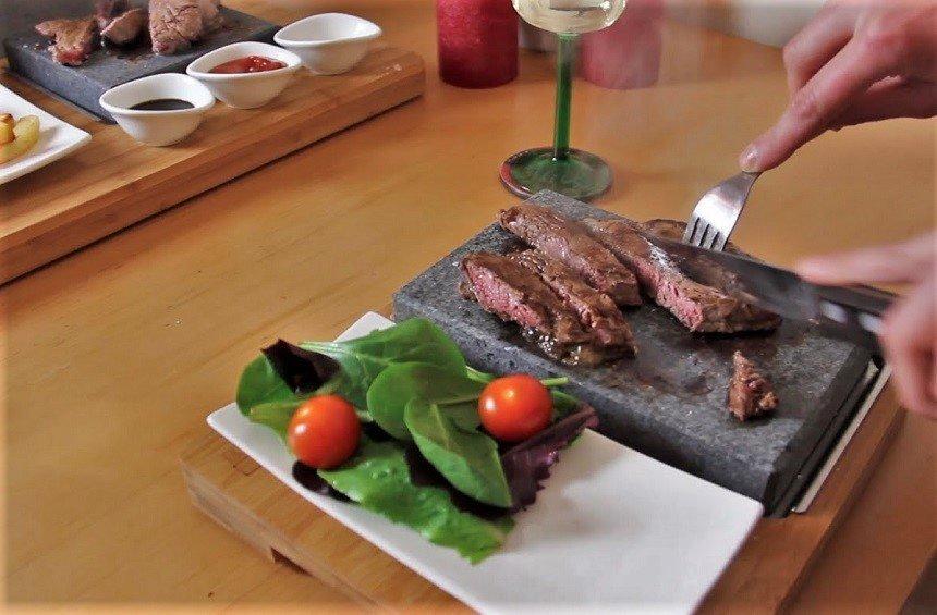 In Limassol, you can eat your steak, while it is being cooked on your plate!