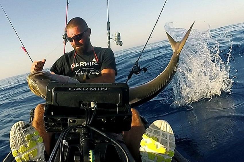 PHOTOS: Kayak fishermen in Limassol's open sea, are their own kind!