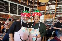 The Mayor served the people dressed as a strawberry!