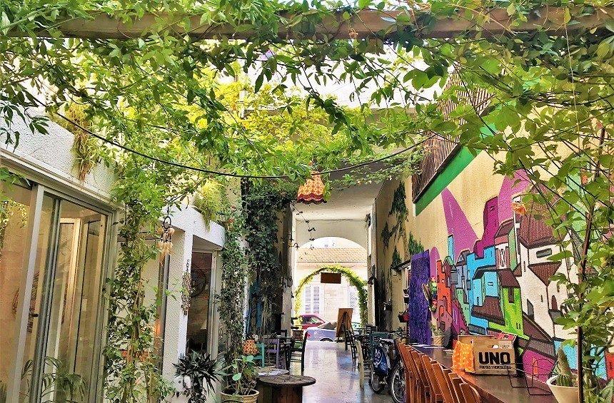 OPENING: A colorful hangout in the square, with a multi-colored, delicious menu!