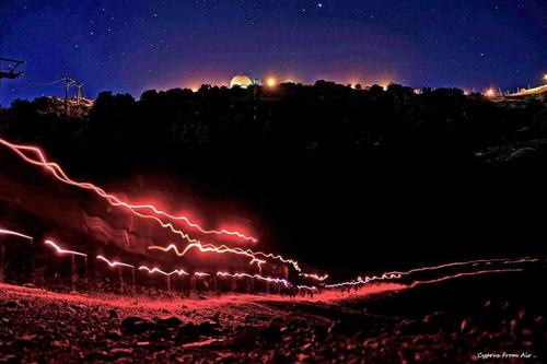 PHOTOS + VIDEO: A  ‘flaming river’ created by hundreds of people on the highest peak of Troodos!