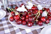 Can you guess what kind of an aromatic delicacy is getting ready in a jar with cheries?