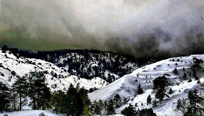 Dark clouds obscure the snowy slopes on Troodos!