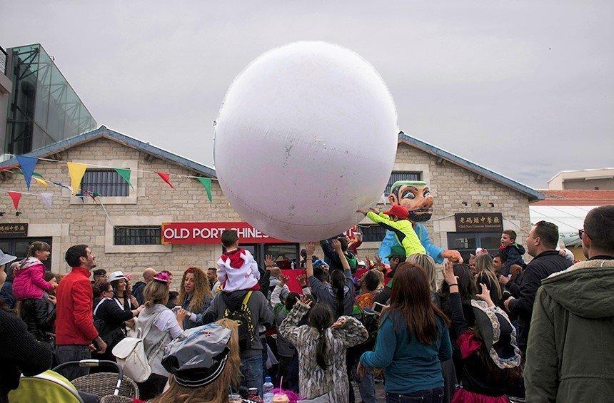 PHOTOS: Huge, white balls were the center of attention in this carnival!