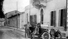 N. P. Lanitis with his car outside of  the house of Panagis Pelendritis (now Aliada restaurant). Photo from the book of Tasos Andreou.